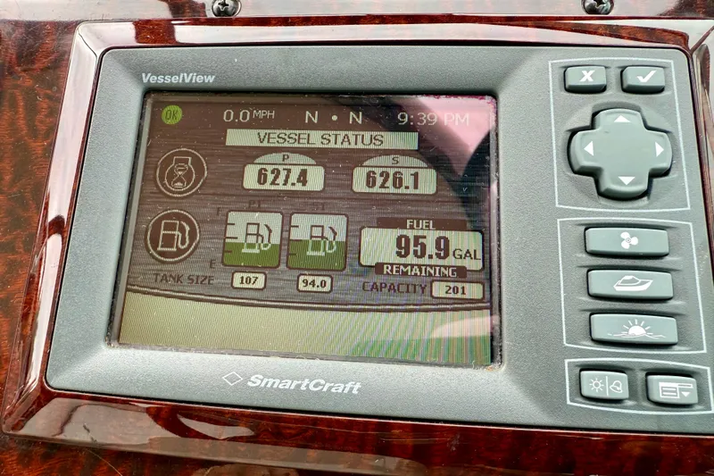 Flip Side Yacht Photos Pics SmartCraft VesselView display on 2010 Sea Ray 330 Sundancer showing fuel status and navigation data.