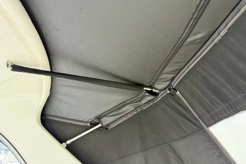 Flip Side Yacht Photos Pics 2010 Sea Ray 330 Sundancer boat canopy with support rods and zippers.