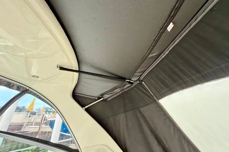 Flip Side Yacht Photos Pics Interior view of 2010 Sea Ray 330 Sundancer boat canopy and support structure.
