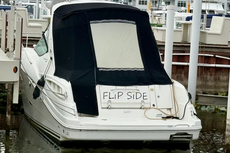 Flip Side Yacht Photos Pics 2010 Sea Ray 330 Sundancer boat named "Flip Side" docked at marina.