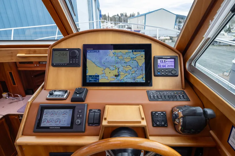 Power Play Yacht Photos Pics 2014 Sabre 38 Salon Express helm with navigation screens and controls.