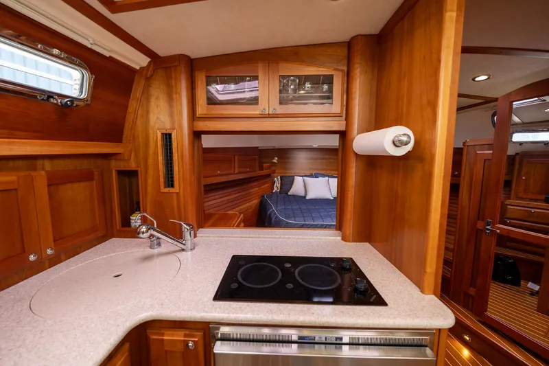 Power Play Yacht Photos Pics 2014 Sabre 38 Salon Express interior with kitchen and bedroom view.