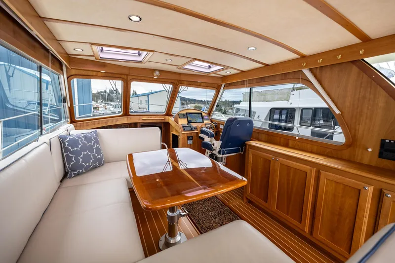 Power Play Yacht Photos Pics 2014 Sabre 38 Salon Express interior with elegant wood finish and spacious seating area.