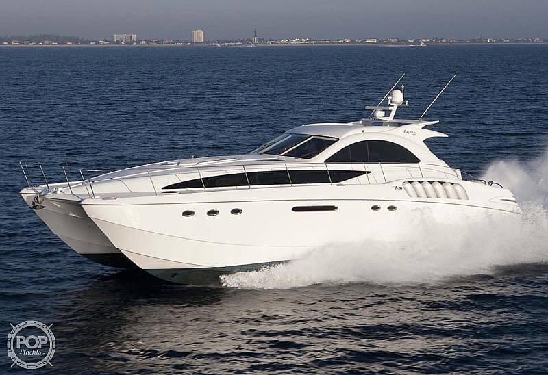 Luxurious 2010 Custom Axcell Yachts 650 Power Catamaran cruising on open water.