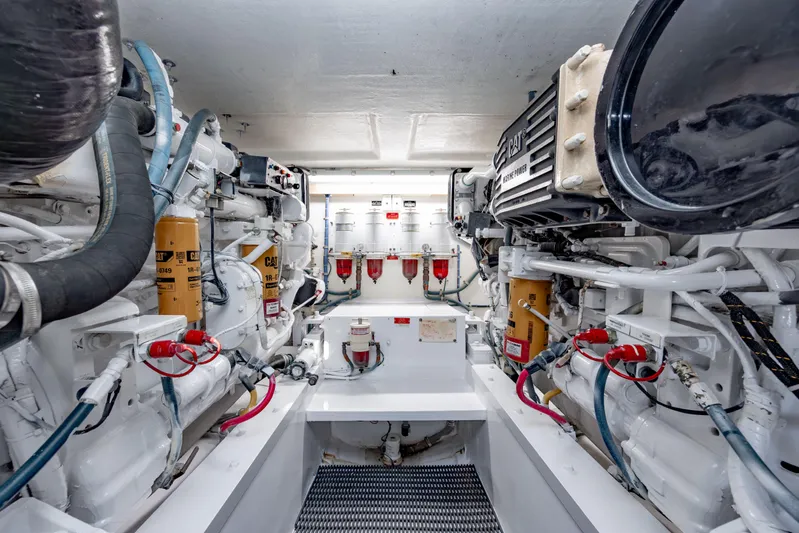  Yacht Photos Pics Engine room of 2000 Hatteras 50 Convertible yacht, featuring CAT marine engines.
