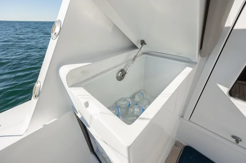  Yacht Photos Pics Open cooler with water bottles on a 2000 Hatteras 50 Convertible yacht.
