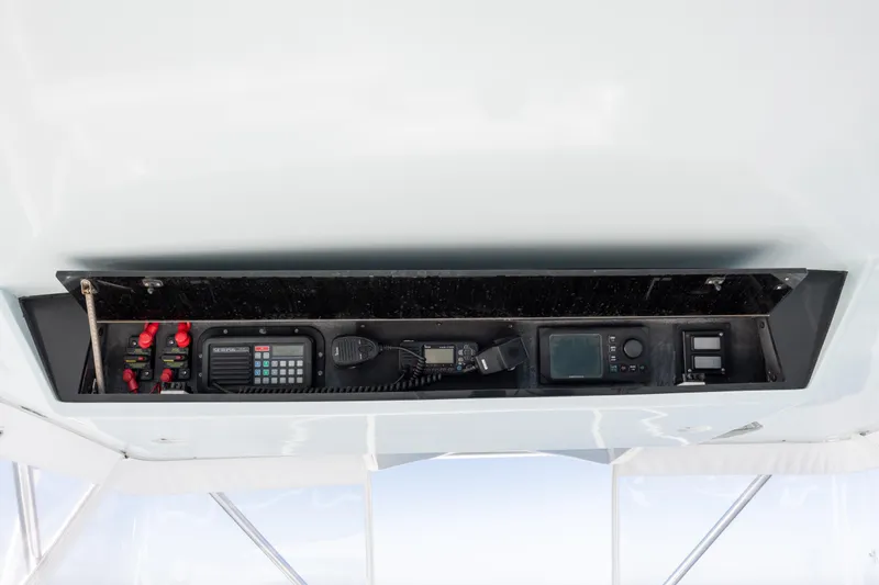  Yacht Photos Pics Control panel of 2000 Hatteras 50 Convertible yacht with communication and navigation equipment.