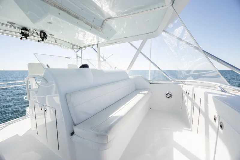  Yacht Photos Pics Luxurious interior of 2000 Hatteras 50 Convertible yacht with ocean view.