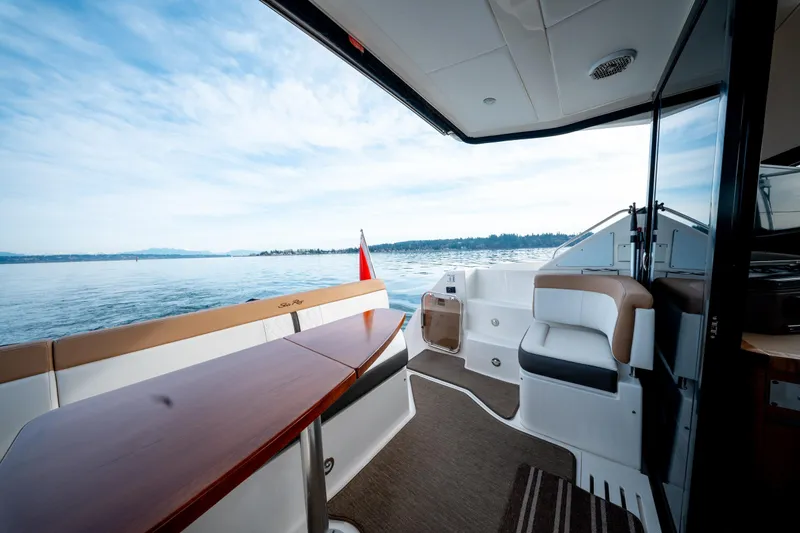  Yacht Photos Pics 2016 Sea Ray Sundancer 400 yacht interior with scenic water view.