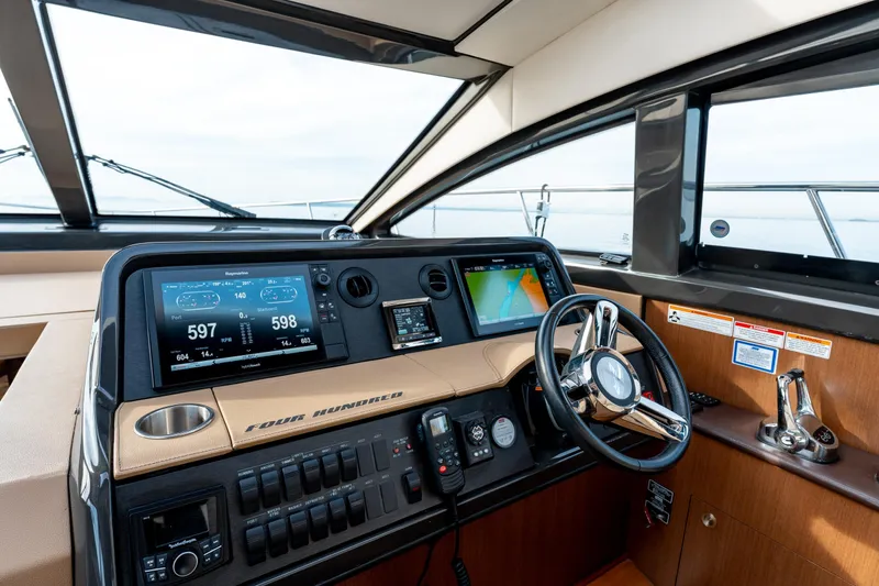  Yacht Photos Pics 2016 Sea Ray Sundancer 400 helm with modern navigation displays and controls.