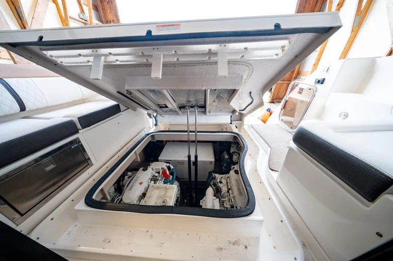  Yacht Photos Pics Engine compartment of 2016 Sea Ray Sundancer 400 yacht, showcasing interior details.