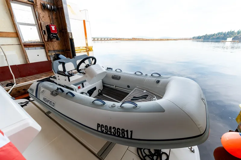  Yacht Photos Pics Inflatable boat docked beside a 2016 Sea Ray Sundancer 400 yacht.
