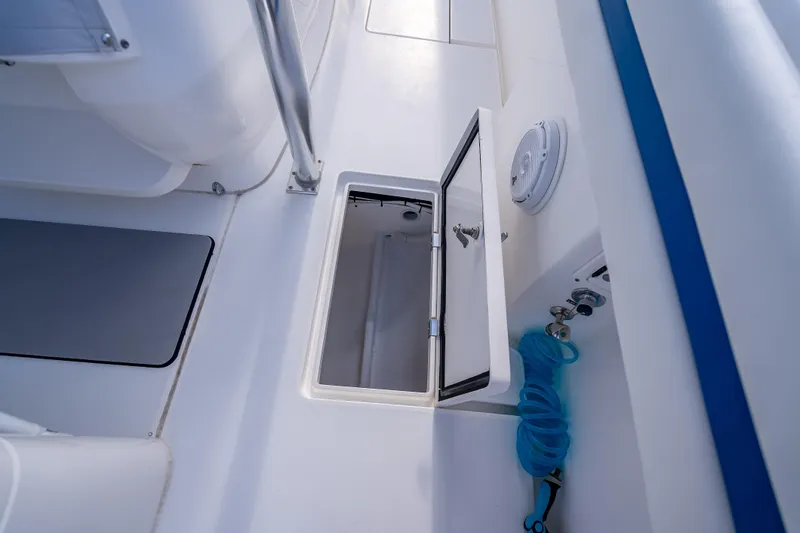 Chasing Chari Yacht Photos Pics 2016 Intrepid 400 Center Console deck with open storage compartment.