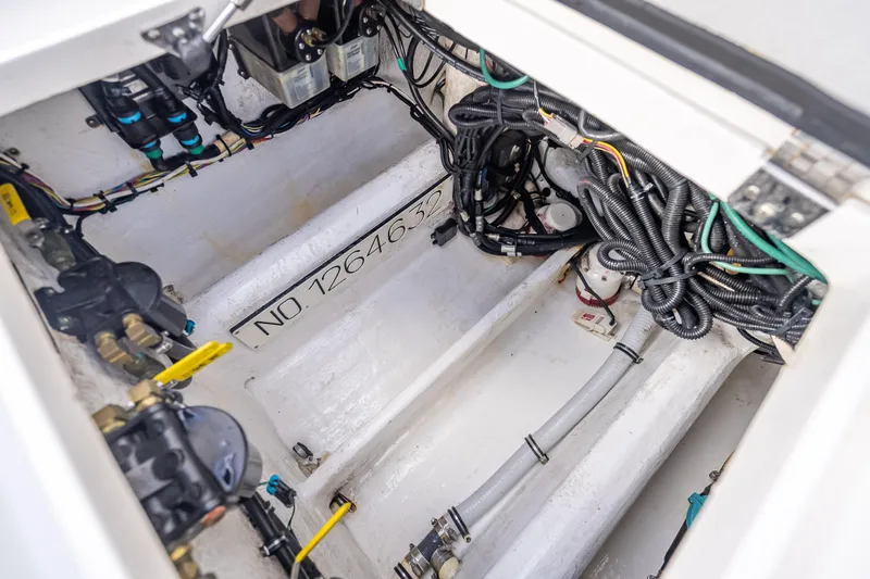 Chasing Chari Yacht Photos Pics 2016 Intrepid 400 Center Console engine compartment with wiring and components visible.