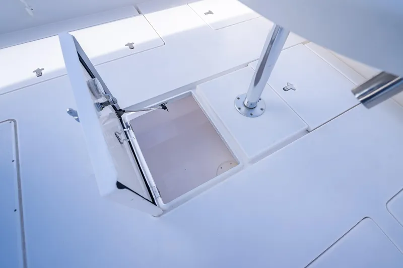 Chasing Chari Yacht Photos Pics Open storage compartment on 2016 Intrepid 400 Center Console boat deck.