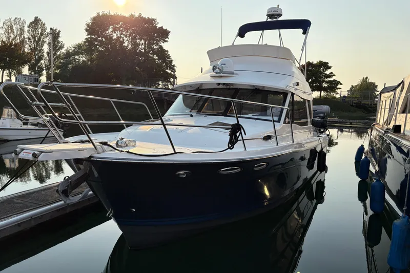 Miller Time Yacht Photos Pics 2018 Cutwater C-30 CB boat docked at marina during sunset.