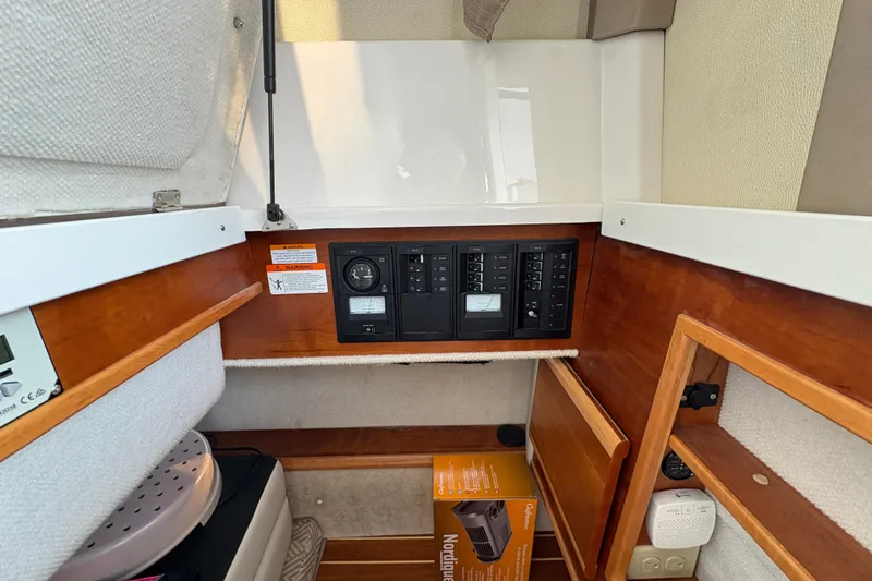 Miller Time Yacht Photos Pics 2018 Cutwater C-30 CB interior with control panel and storage compartments.