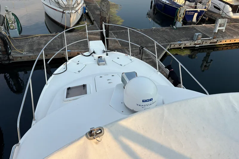 Miller Time Yacht Photos Pics 2018 Cutwater C-30 CB boat docked at marina, featuring TracVision satellite system.