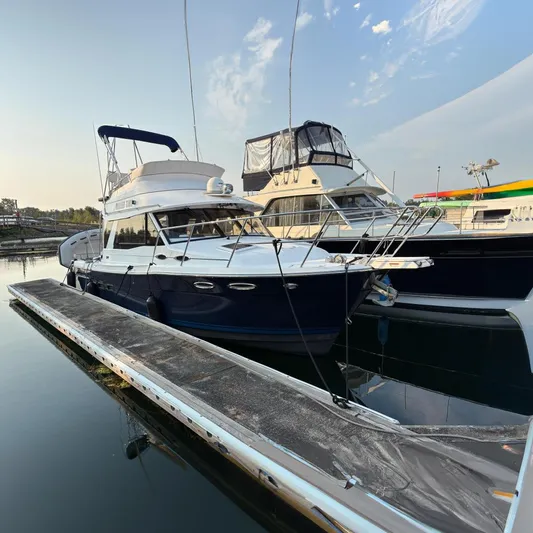 Miller Time Yacht Photos Pics 2018 Cutwater C-30 CB boat docked at marina, featuring sleek design and modern amenities.