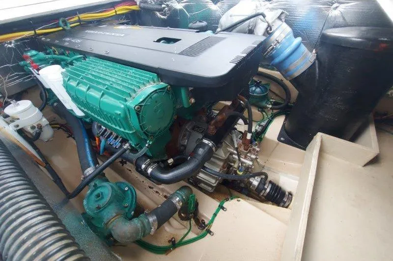 Miller Time Yacht Photos Pics Engine compartment of a 2018 Cutwater C-30 CB boat, showcasing mechanical components.