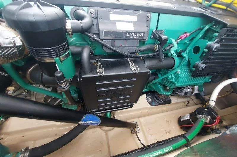 Miller Time Yacht Photos Pics Engine compartment of a 2018 Cutwater C-30 CB boat, showcasing mechanical components.