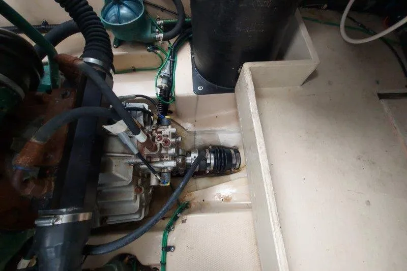 Miller Time Yacht Photos Pics Engine compartment of 2018 Cutwater C-30 CB boat, showing mechanical components and hoses.