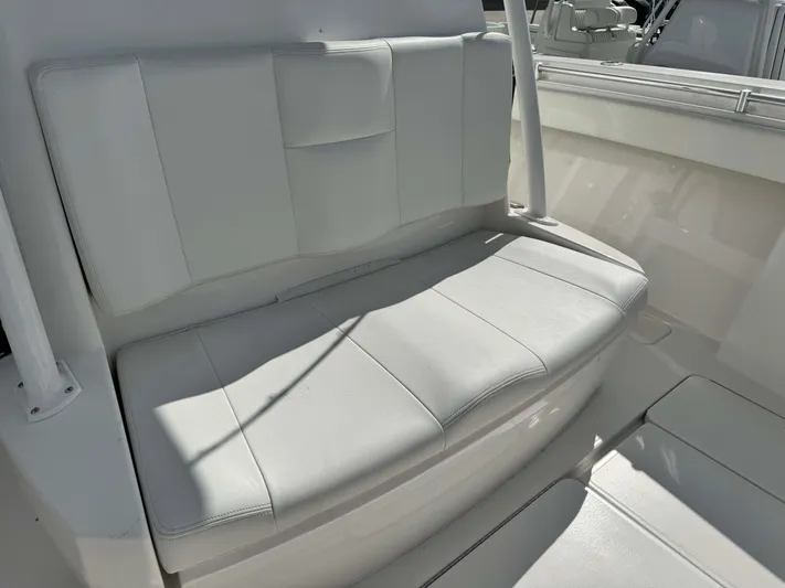  Yacht Photos Pics 2016 Invincible 39' Open Fisherman boat seat, white upholstery, sleek design.