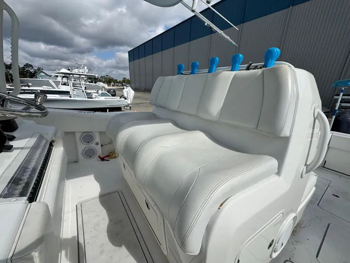  Yacht Photos Pics 2016 Invincible 39' Open Fisherman boat with white seating and rod holders.