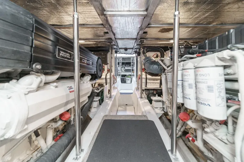  Yacht Photos Pics Engine room of 2003 Carver 570 Voyager Pilothouse with Volvo Penta engines.