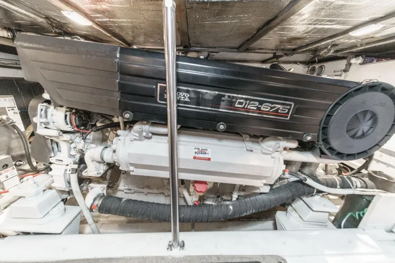  Yacht Photos Pics Engine room of 2003 Carver 570 Voyager Pilothouse with Volvo Penta D12-675 engine.