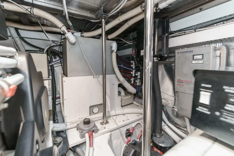  Yacht Photos Pics Engine room of 2003 Carver 570 Voyager Pilothouse with mechanical and electrical components.