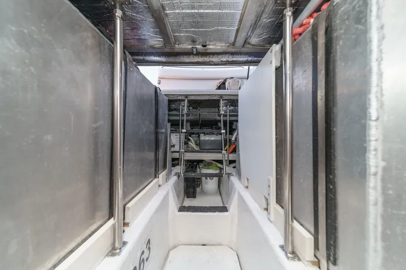  Yacht Photos Pics Engine room of 2003 Carver 570 Voyager Pilothouse with metal panels and equipment.