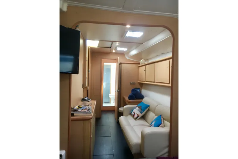 Rewind Yacht Photos Pics Interior of 2007 Lagoon 440 catamaran with cozy seating and modern amenities.