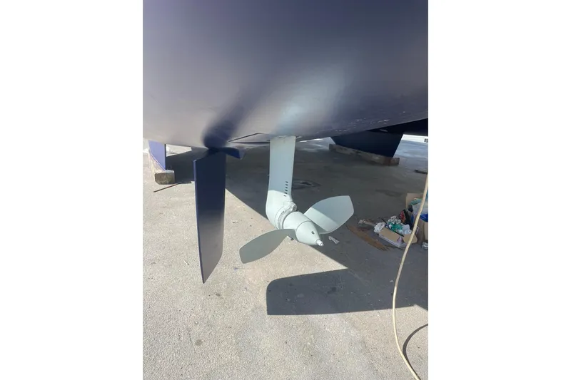 Rewind Yacht Photos Pics Propeller and rudder of a 2007 Lagoon 440 catamaran on dry dock.