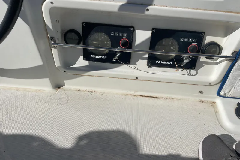 Rewind Yacht Photos Pics Control panel of a 2007 Lagoon 440 catamaran with Yanmar engine gauges.