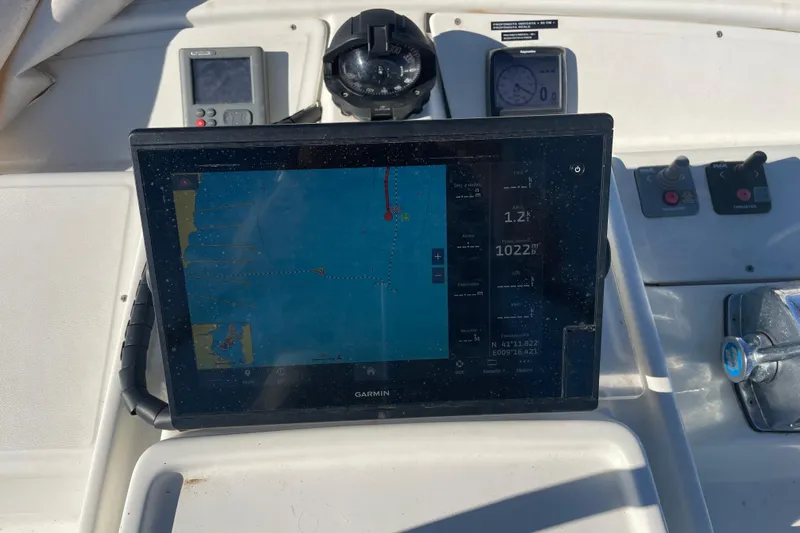 Rewind Yacht Photos Pics Navigation system on a 2007 Lagoon 440 catamaran, featuring a Garmin display.