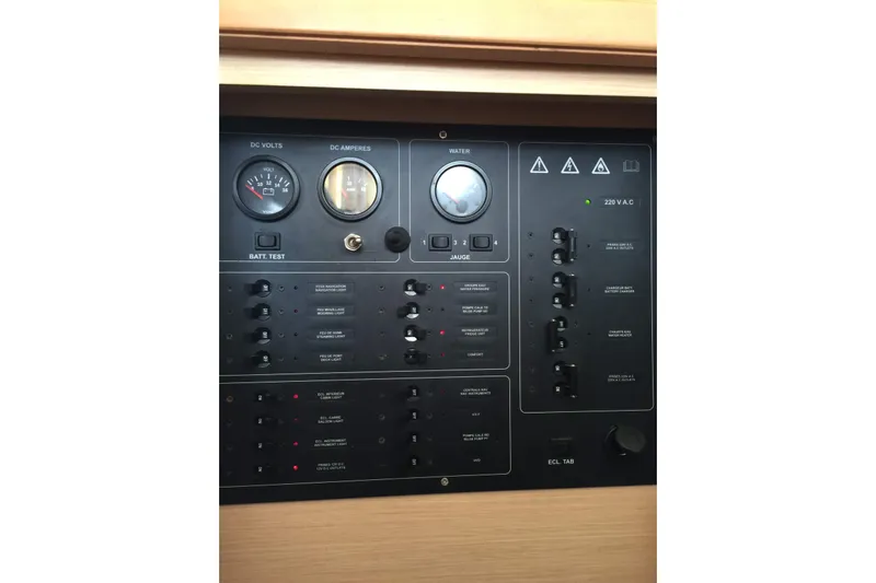 Rewind Yacht Photos Pics Control panel of a 2007 Lagoon 440 yacht, featuring gauges and switches.