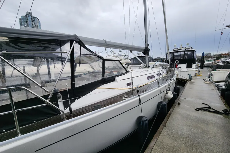 Danza Yacht Photos Pics Sailboat Hanse 400e 2007 docked at marina on a cloudy day.