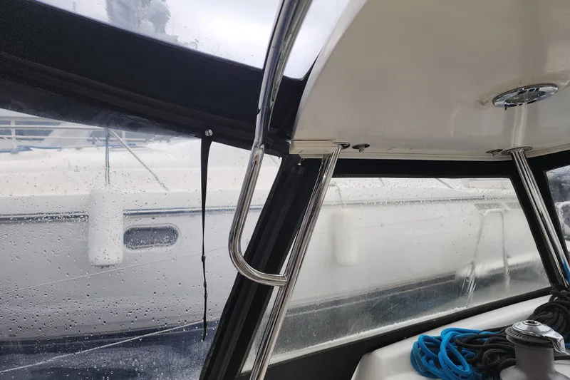 Danza Yacht Photos Pics Interior view of a 2007 Hanse 400e yacht with rain-soaked windows.