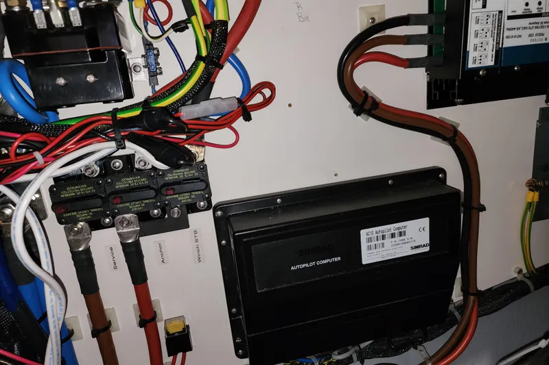 Danza Yacht Photos Pics Electrical panel of a 2007 Hanse 400e yacht with autopilot computer and wiring.