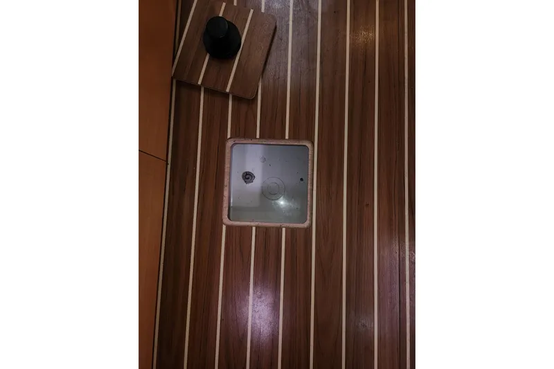 Danza Yacht Photos Pics Wooden deck of 2007 Hanse 400e yacht with hatch and winch.