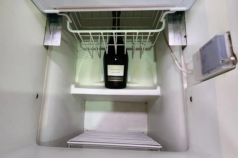 Danza Yacht Photos Pics Wine bottle in a 2007 Hanse 400e yacht refrigerator.