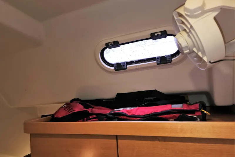 Danza Yacht Photos Pics Interior of 2007 Hanse 400e yacht with life jackets and porthole.