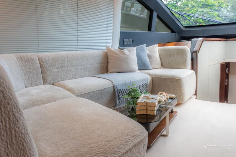 Fairline Phantom Yacht Photos Pics Luxurious interior of 2023 Fairline Phantom 65 yacht with plush seating and modern decor.