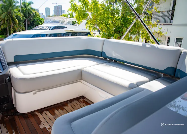 Fairline Phantom Yacht Photos Pics 2023 Fairline Phantom 65 yacht with luxurious outdoor seating area.