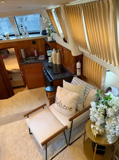 Miracles Yacht Photos Pics Interior of 2006 Carver 41 Cockpit Motor Yacht with cozy seating and elegant decor.