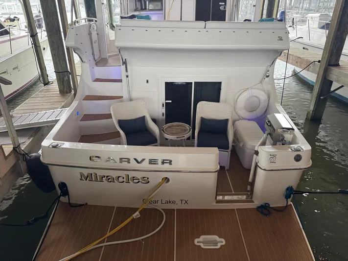 Miracles Yacht Photos Pics 2006 Carver 41 Cockpit Motor Yacht docked, featuring outdoor seating and Clear Lake, TX location.