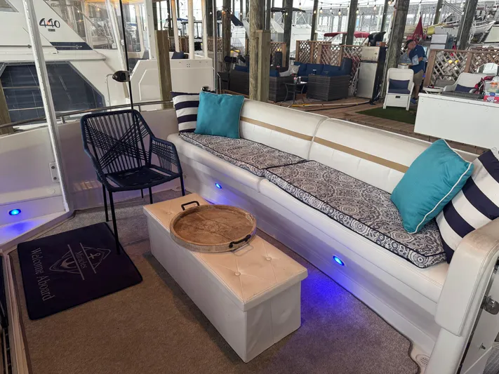 Miracles Yacht Photos Pics Luxurious 2006 Carver 41 Cockpit Motor Yacht interior with elegant seating and decor.