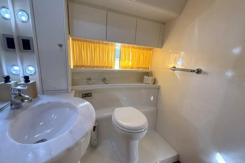 M/y Kosmos II Yacht Photos Pics Luxurious bathroom interior of 2006 Ferretti 530 yacht with modern fixtures.