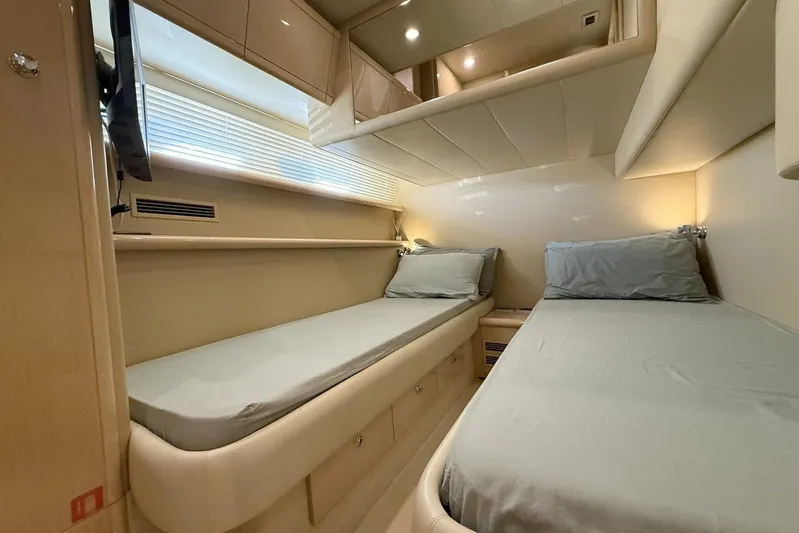 M/y Kosmos II Yacht Photos Pics Luxurious twin cabin interior of 2006 Ferretti 530 yacht with modern design.